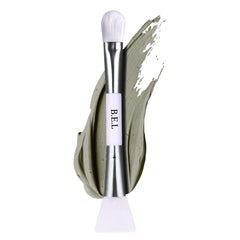 Bare Essentials Living dual-sided clay mask brush for versatile facial application.