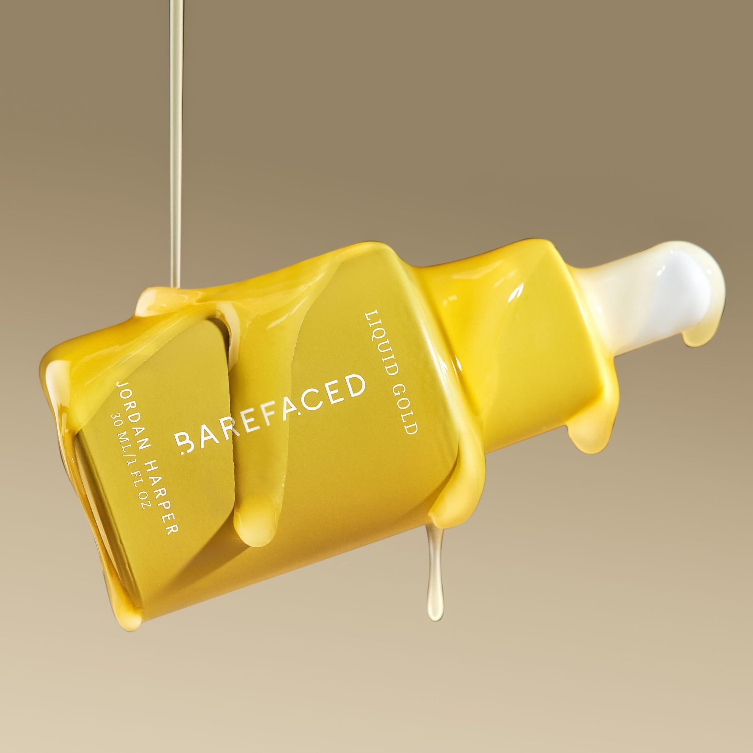 Barefaced Liquid Gold bottle with skincare essentials for a simple ritual