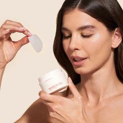 Barefaced Toning Pads II on cheek during application for smoother skin