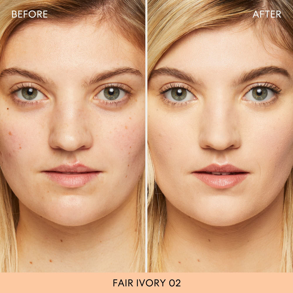 Soft brush applying bareMinerals powder for a natural glow.