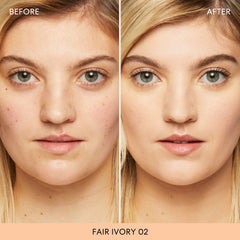 Soft brush applying bareMinerals powder for a natural glow.