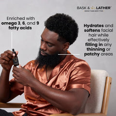 Bask & Lather Beard Magic Growth Oil being poured for even application.