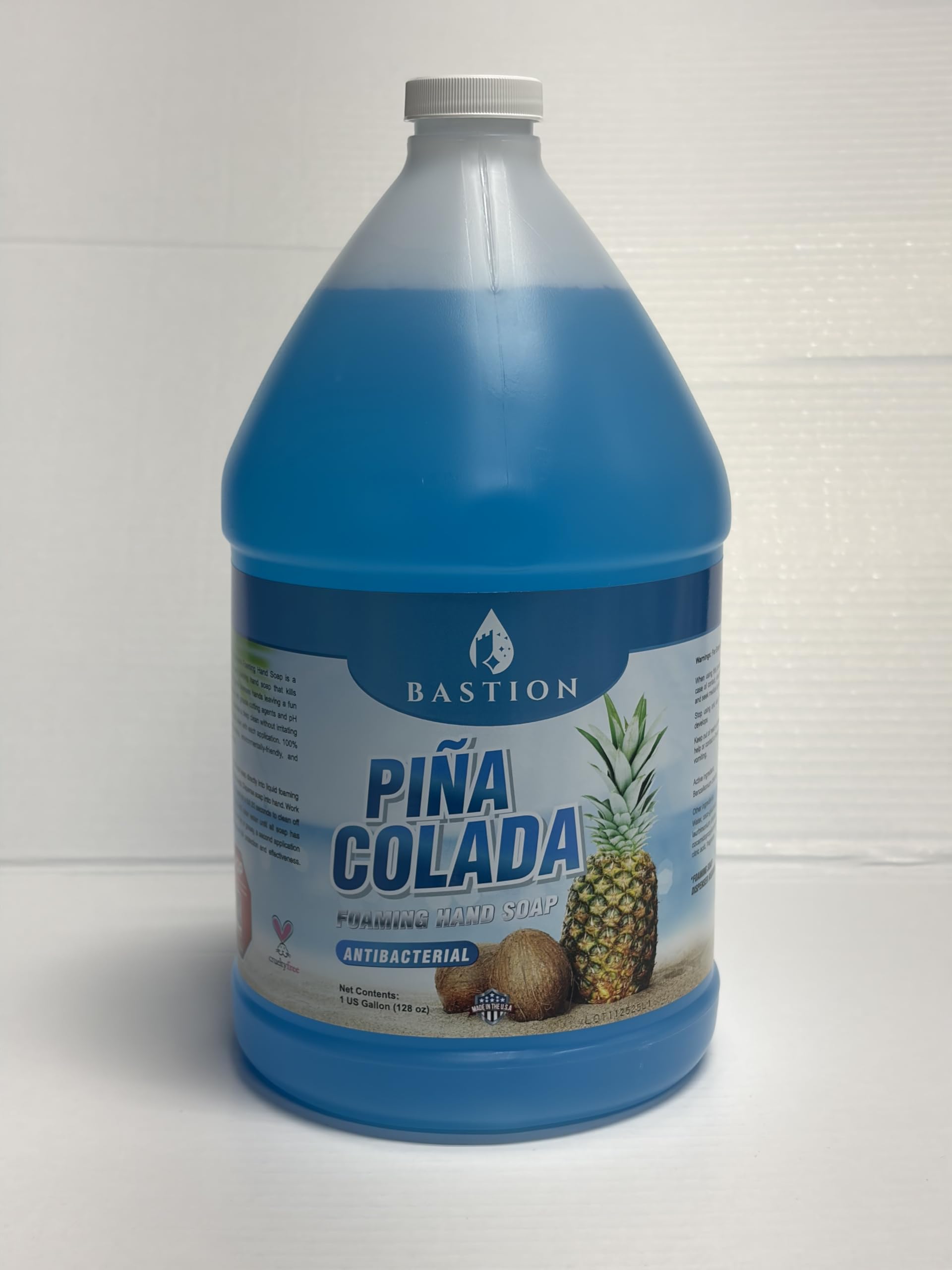 Bastion Pina Colada scent bottle highlighting tropical fragrance for bathroom.