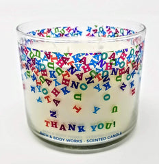 Decorative candle jar with ambient glow from Champagne Toast.
