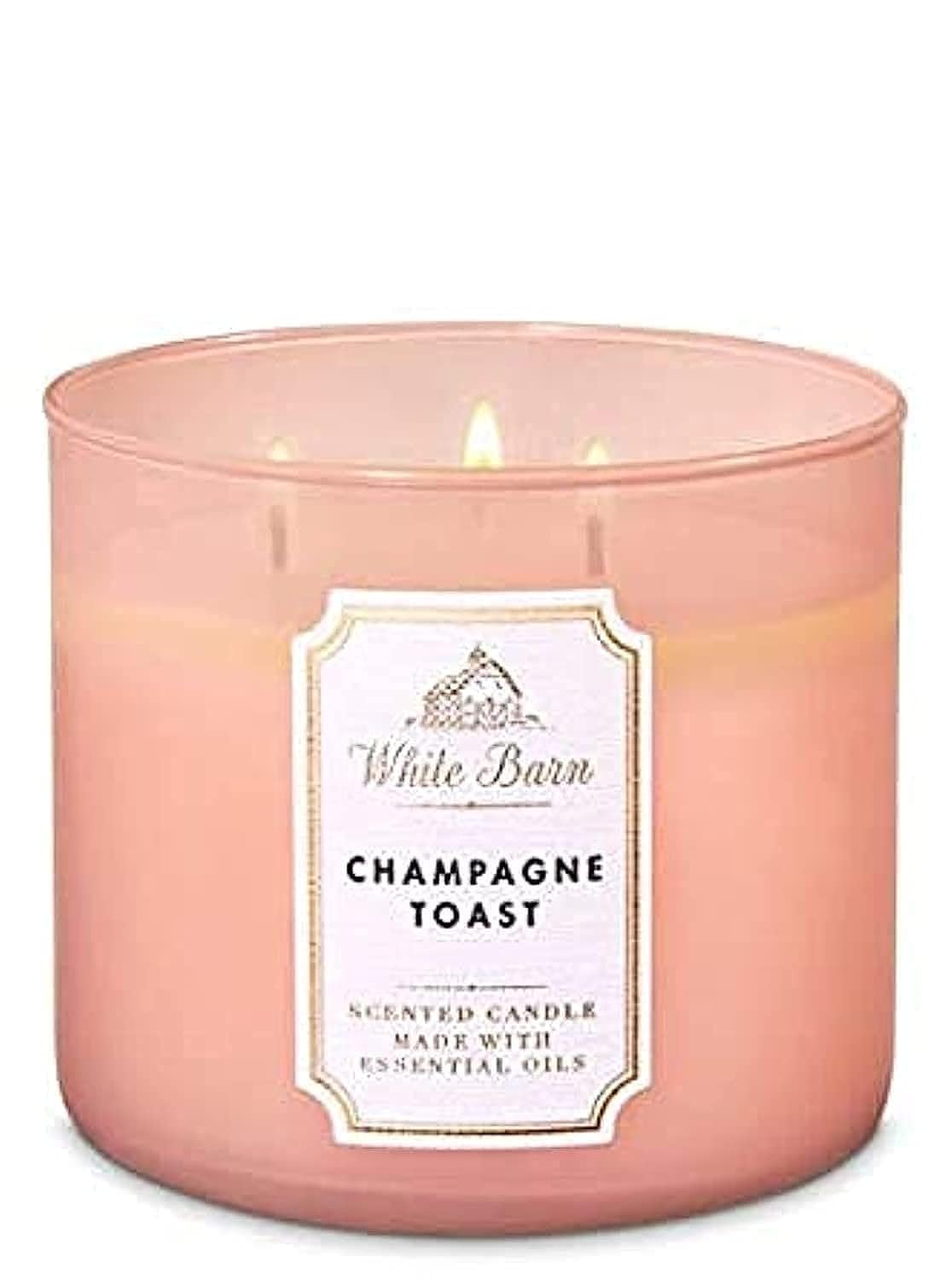 Bath & Body Works Champagne Toast 3-wick candle for warm ambiance.