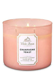 Bath & Body Works Champagne Toast 3-wick candle for warm ambiance.