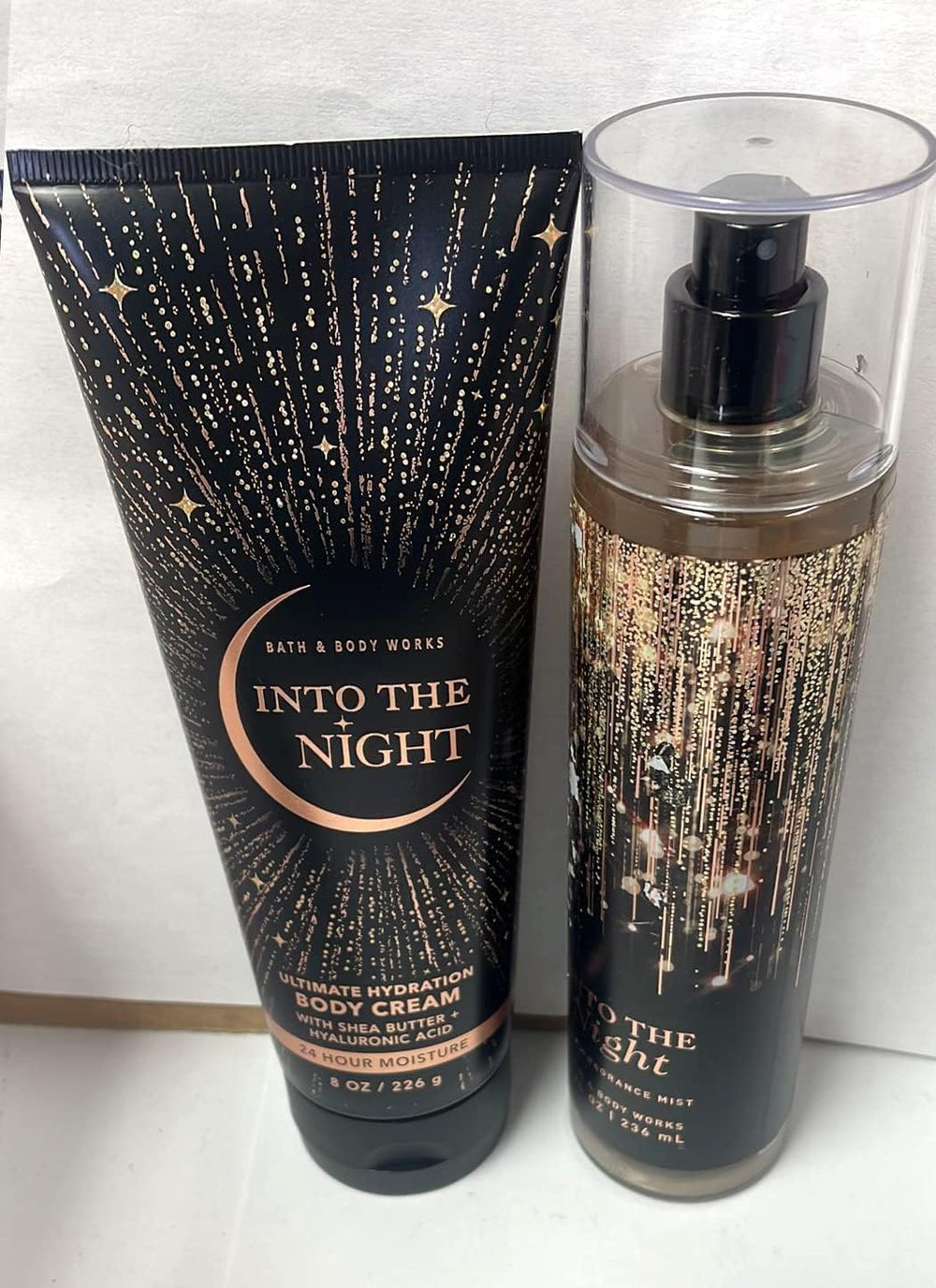 Bath & Body Works Into the Night Ultra Shea Body Cream for post-shower hydration.