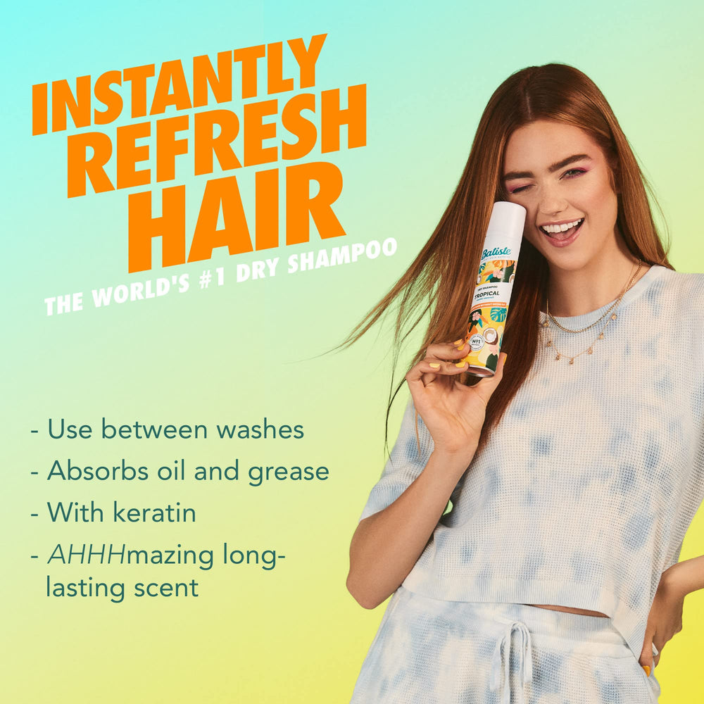Batiste Tropical Dry Shampoo bottle side view highlighting compact, travel-friendly design.