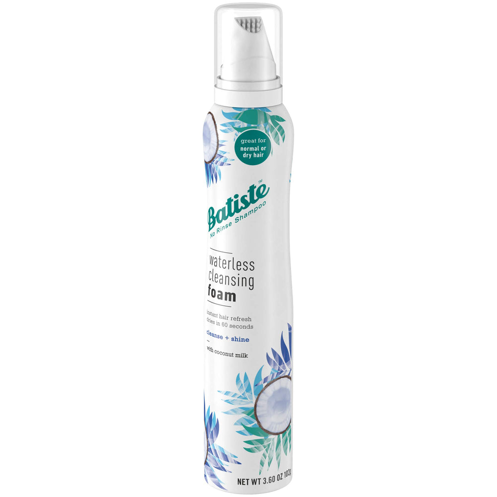Batiste coconut milk foam application in hand demonstrates easy massage.
