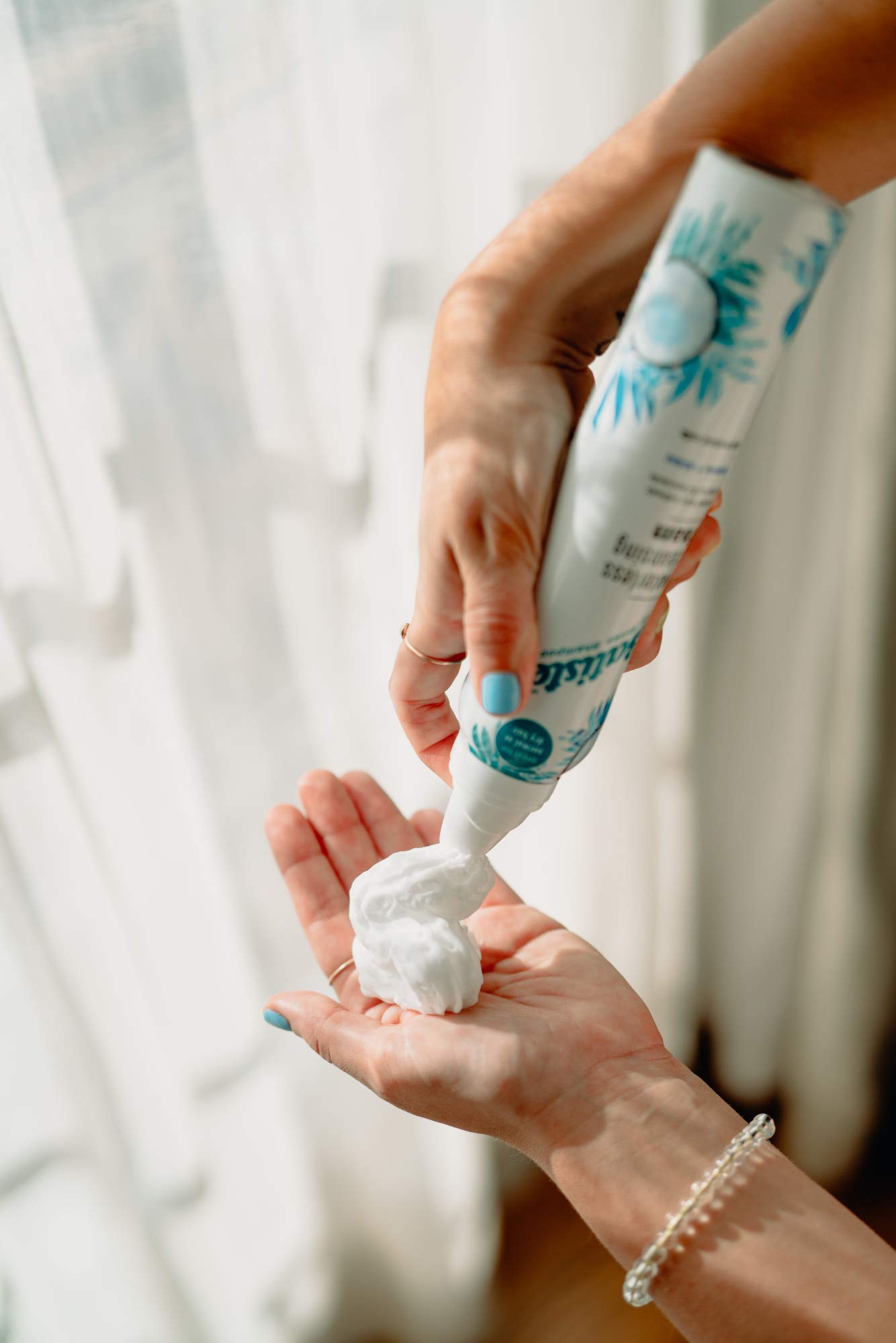 Batiste hair after use shows radiant shine with no residue.