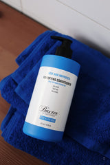 Dispensing pump shown for easy application of Baxter conditioner