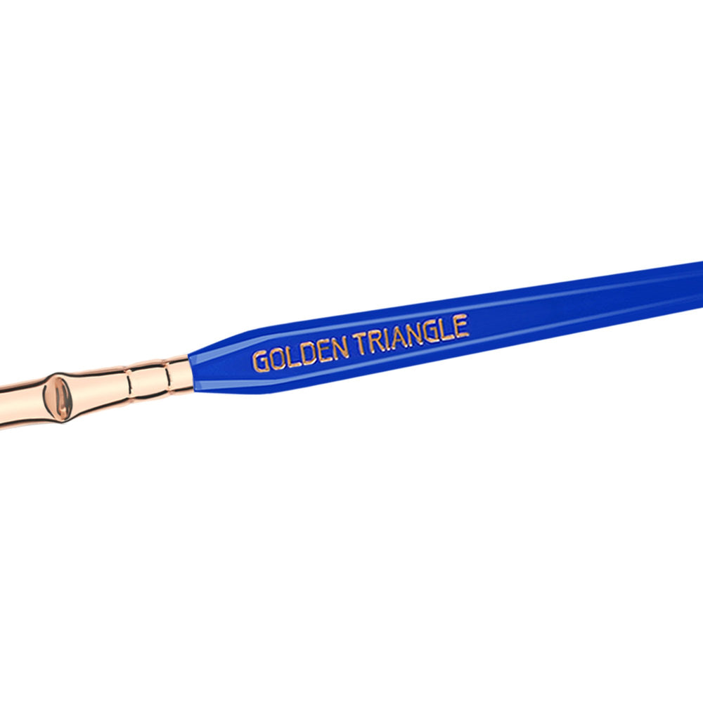 Bdellium blue brush in use on lashes for subtle build.