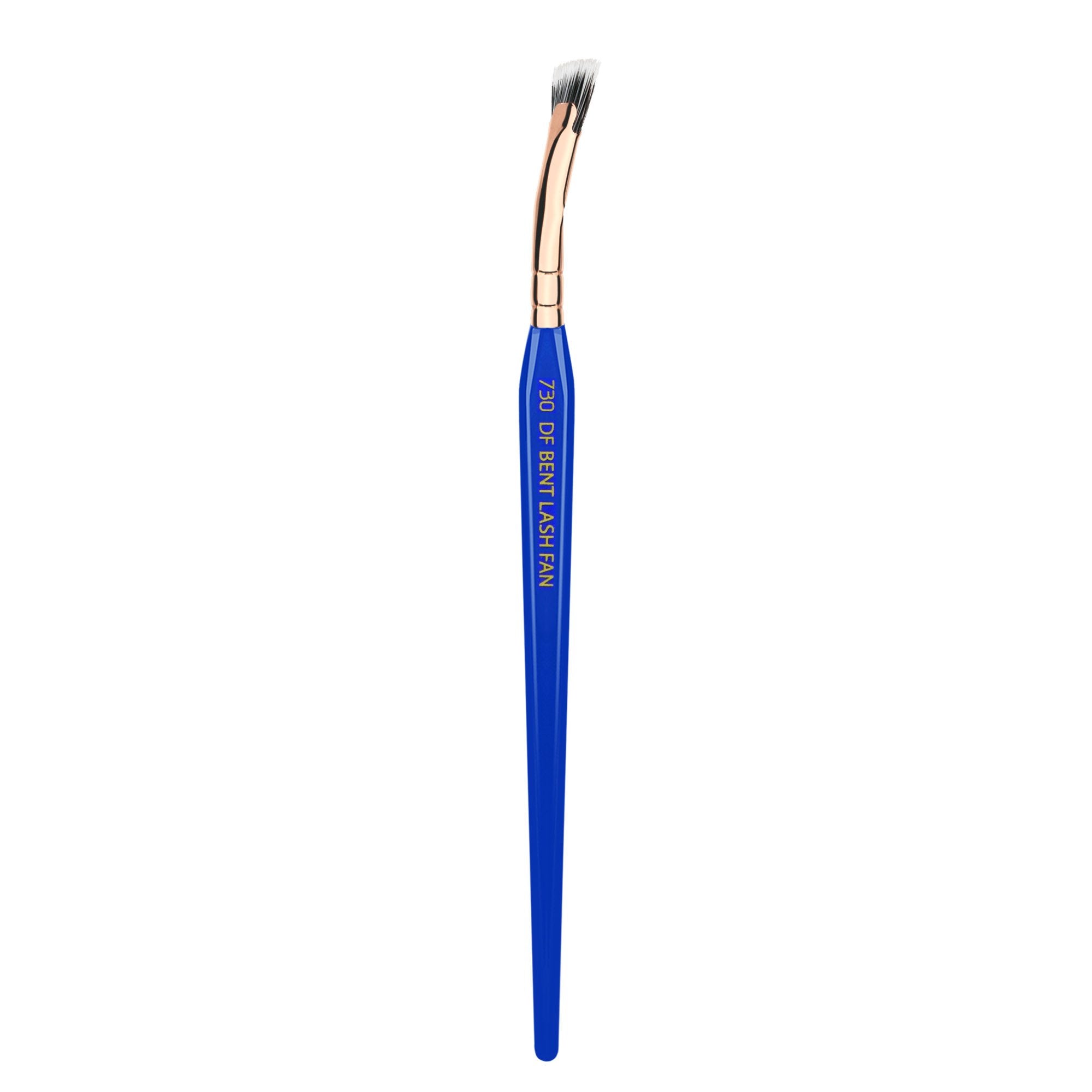 Bdellium Tools Golden Triangle 730 mascara fan reaching lash roots with precision.