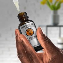 Daily beard care routine featuring Beard Guyz Serum and grooming tools.