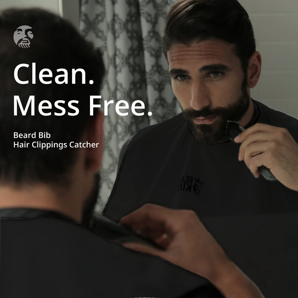BEARD KING mirror suction cups securing the apron during shaving.