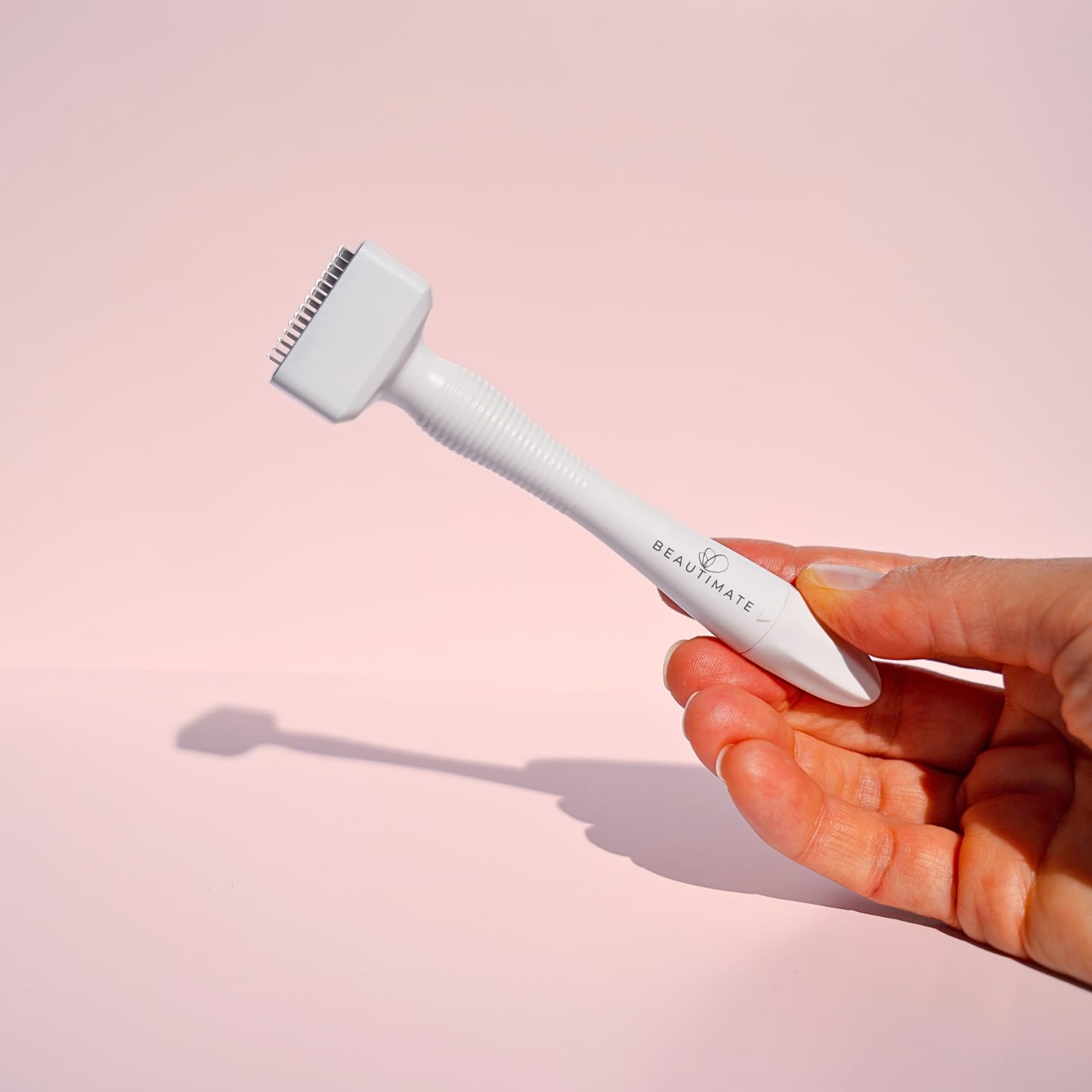 Beautimate Derma Stamp handheld tool provides precise control.