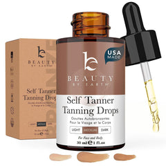 Beauty by Earth self tanning drops bottle showing clean, USA-made formula for all skin tones