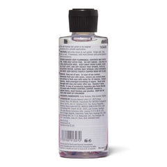 Beauty Secrets nail polish thinner pour demonstrates controlled thinning for precise manicure results.