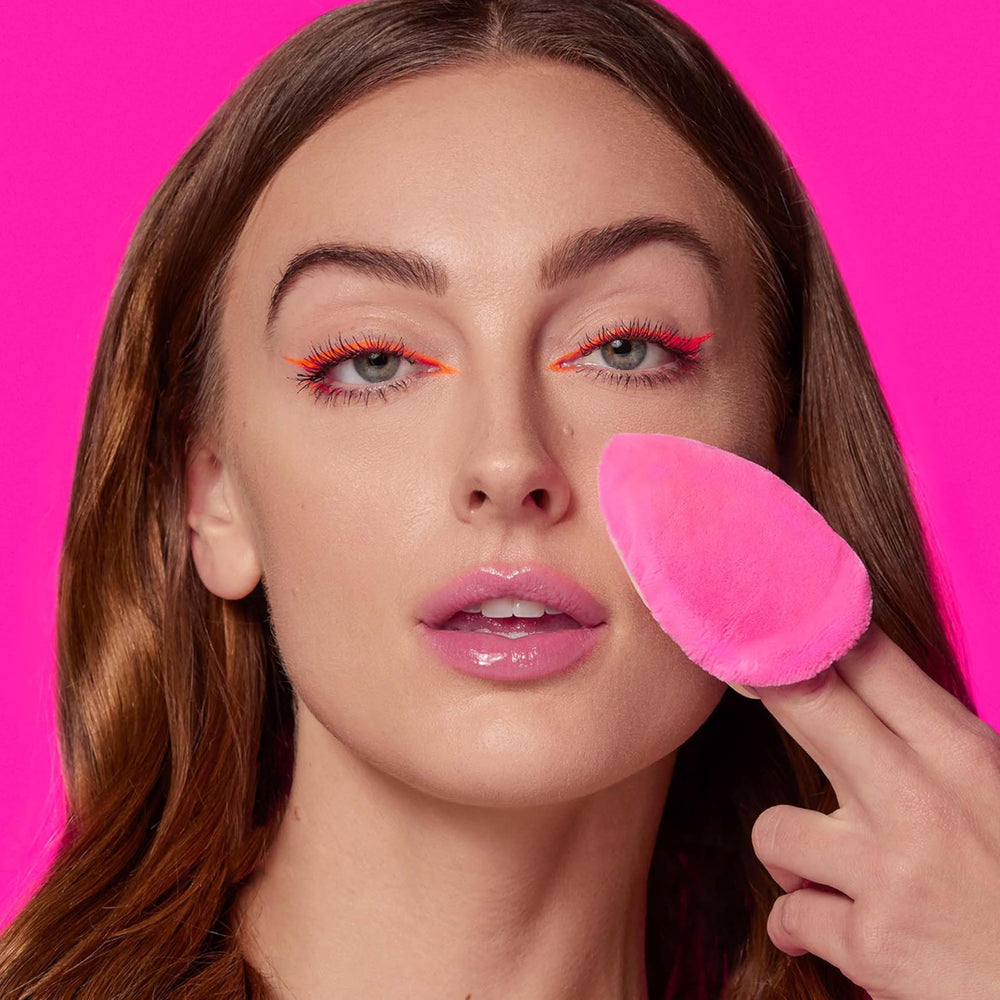 Beautyblender Pocket Puff travel-friendly size fits in your bag for quick touchups.