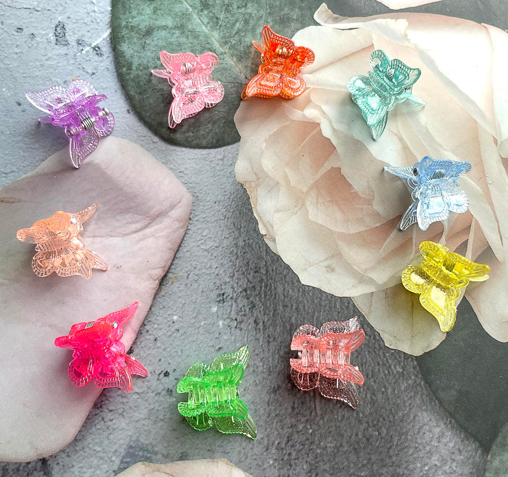 Pinza mariposa mini BEBEEPOO, tamaño compacto para arreglos rápidos.