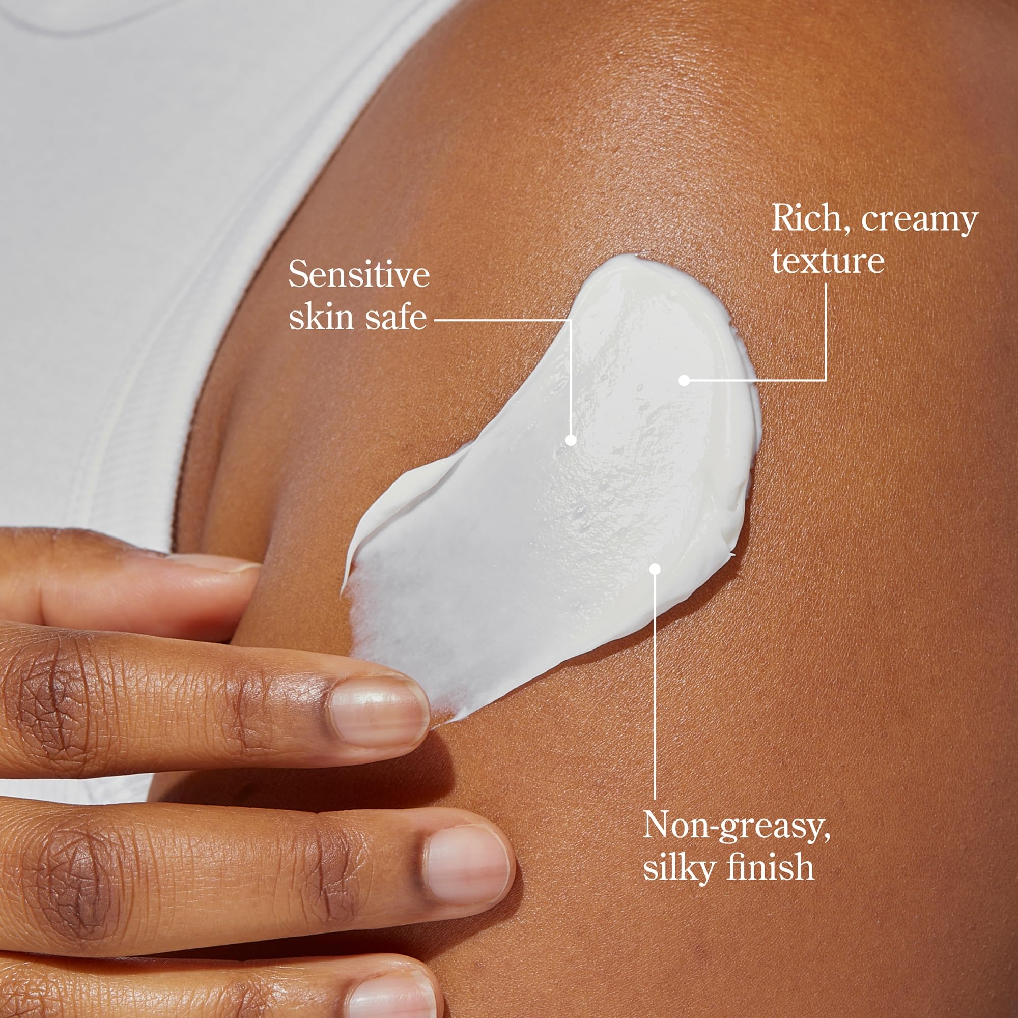 Beekman 1802 Pure Whipped Body Cream applied to hands for hydration