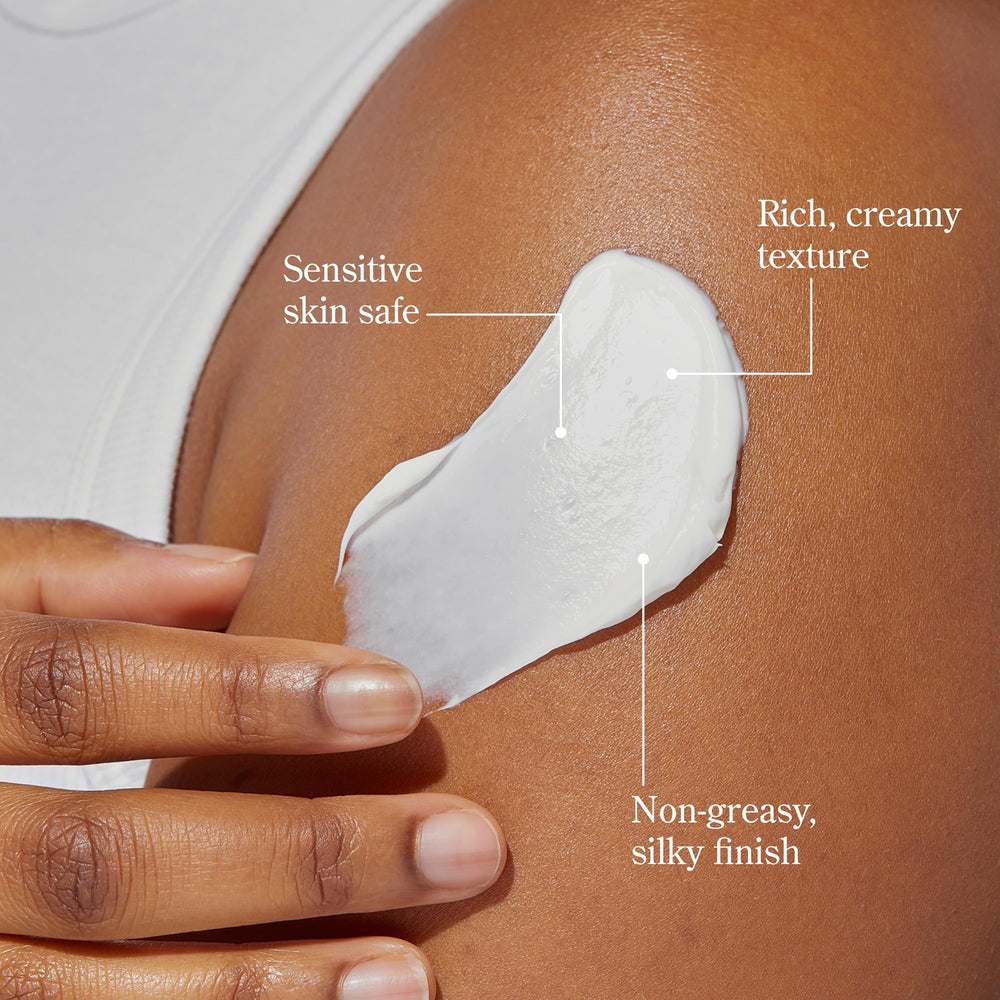 Beekman 1802 Pure Whipped Body Cream applied to hands for hydration
