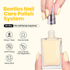 Beetles Butter Yellow brush applying soft yellow color for quick-dry manicure