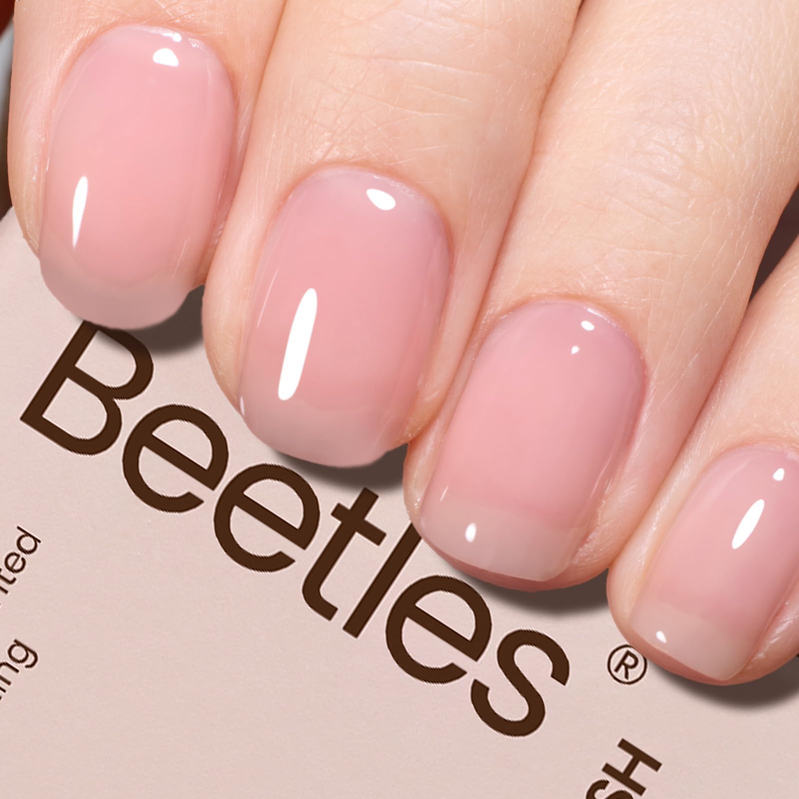 Beetles: esmalte gel nude rosa translúcido para un look natural en uñas.