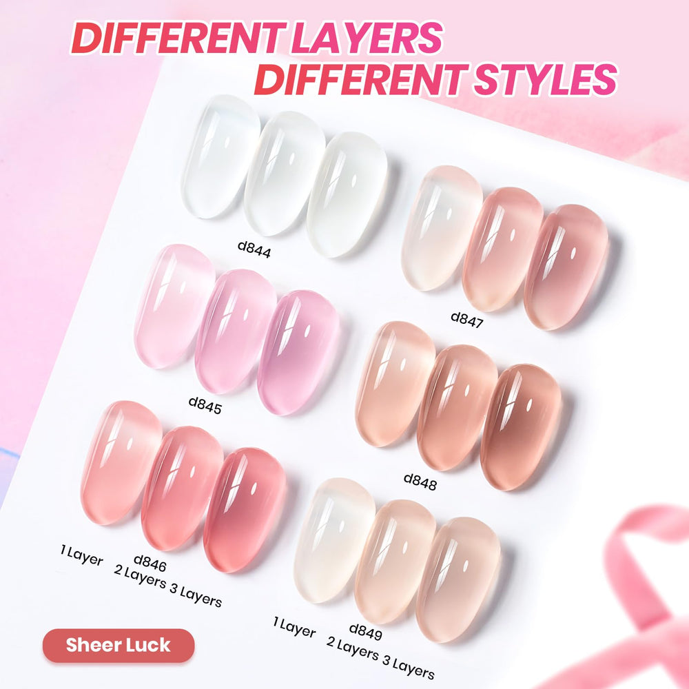 Beetles Jelly Gel on nails with swirl style in soft nude pink.