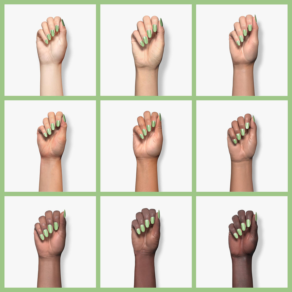 Beetles pastel-green gel polish applied for spring nail art