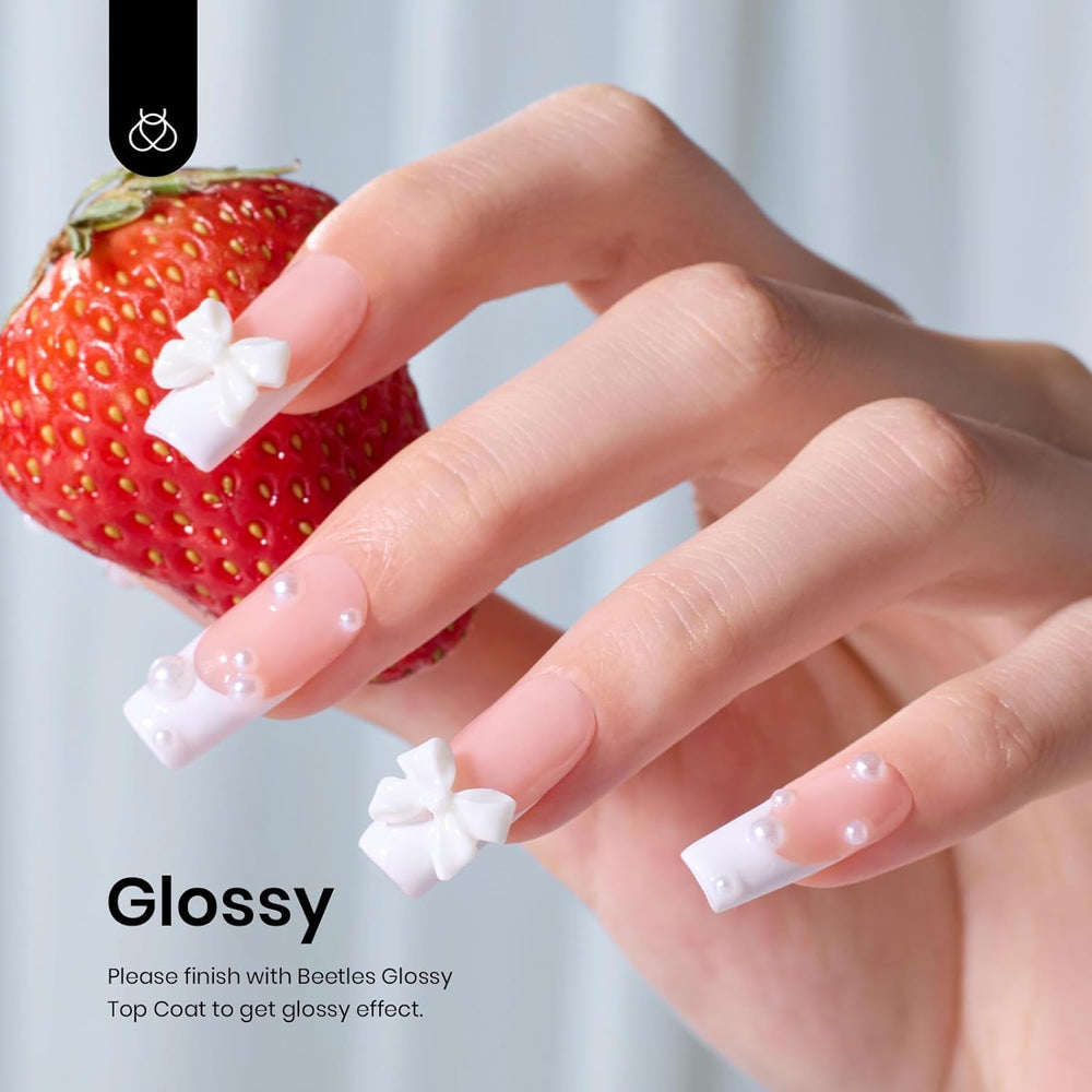 Beetles White Gel Nail Polish application on nail for a smooth finish.