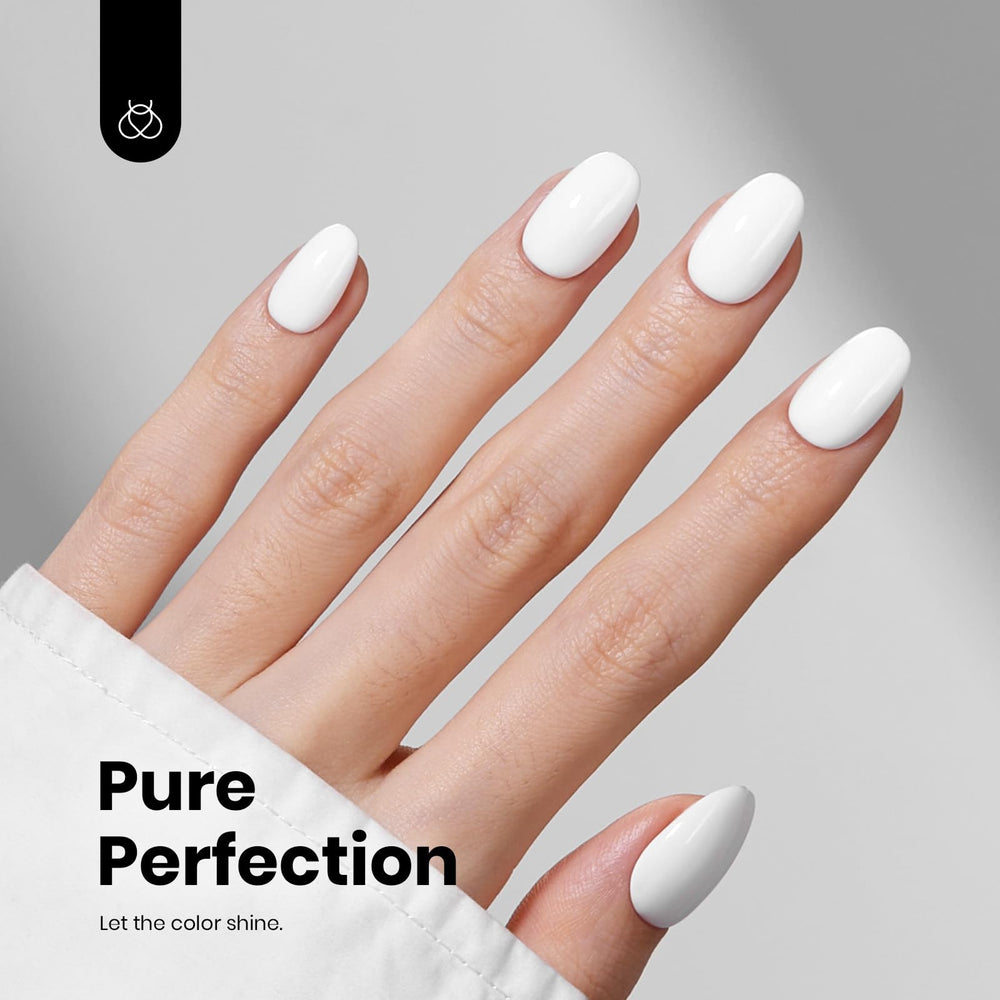 Beetles White Gel Polish bottle in hand for convenient at-home nail care