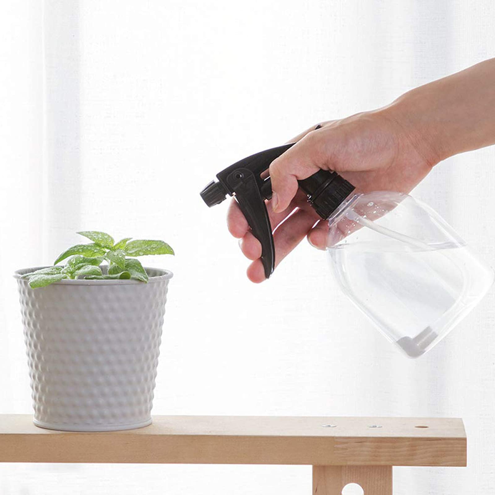 Bekith 8 oz spray bottle in use for misting air freshener or cleaning solution