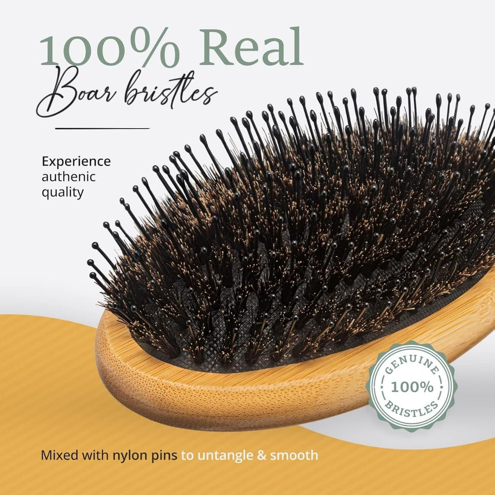 Belula Boar Bristle Hair Brush on bathroom counter captures compact easy-to-grip design