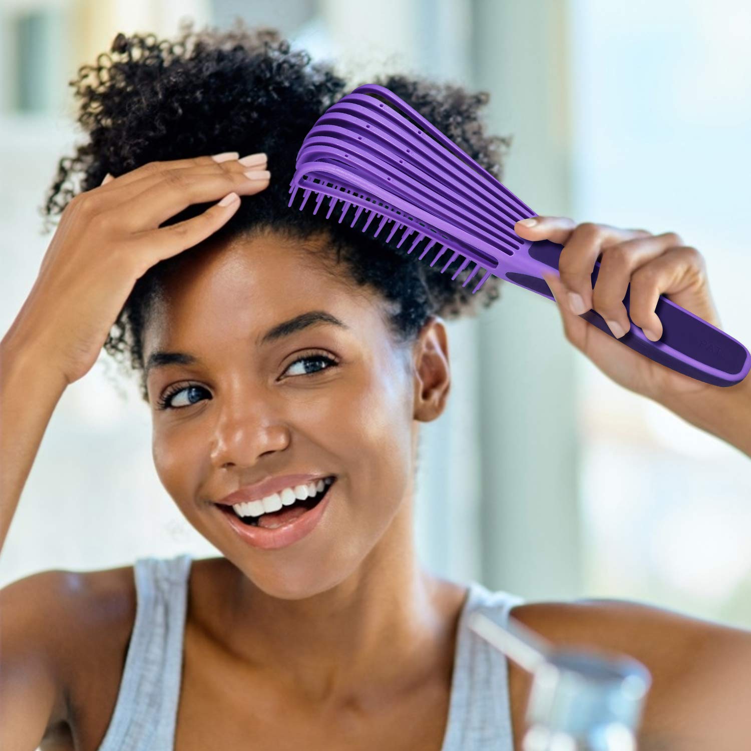 BESTOOL detangling brush purple handle combines style with travel-friendly design.