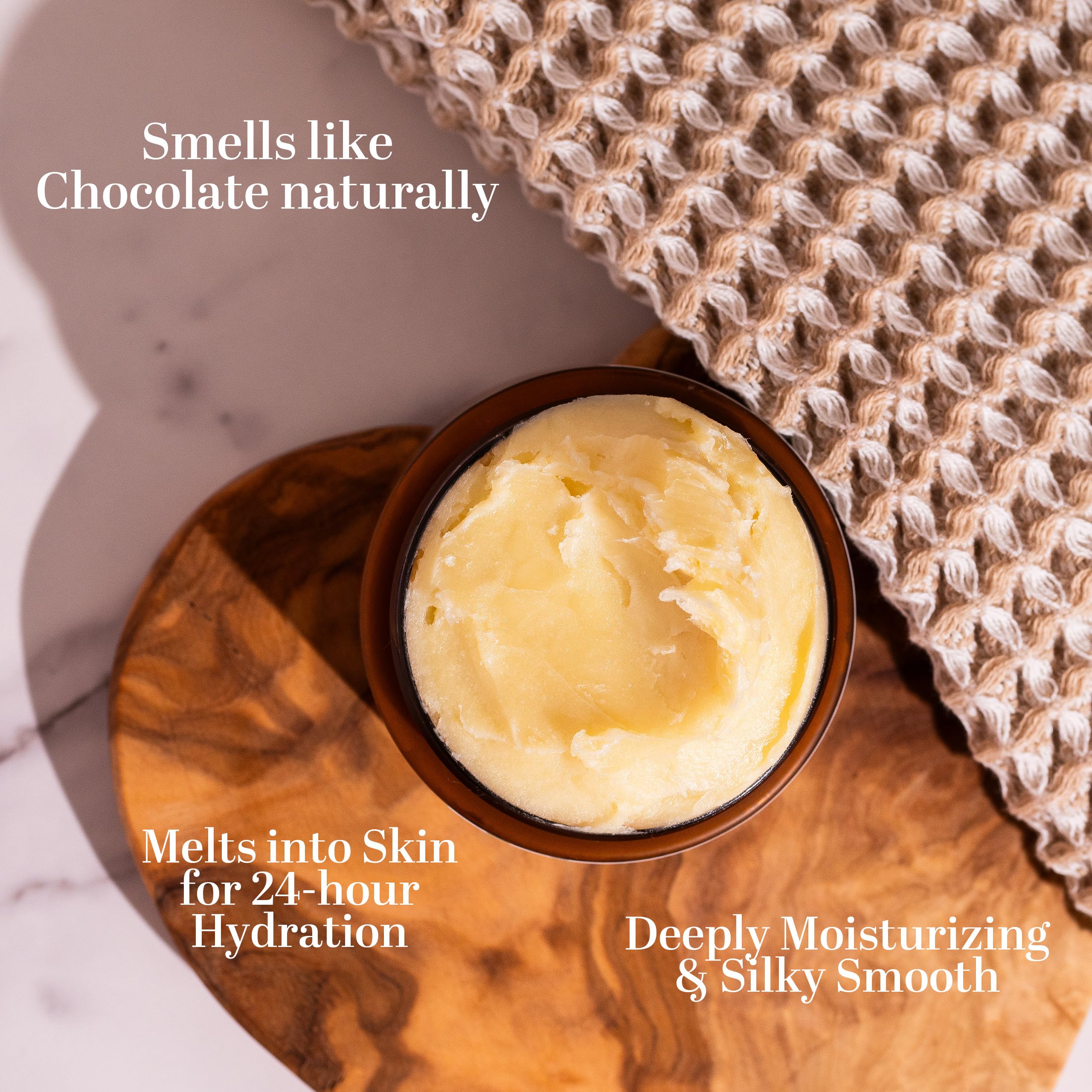 Hands applying Better Shea Butter Scar Eraser Balm on arm for scar care