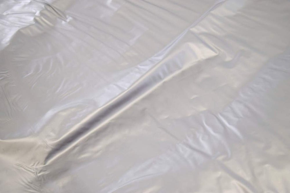 Betty Dain Jumbo Shampoo Cape neckband closeup shows comfortable, soft nylon edge.