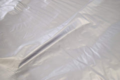 Betty Dain Jumbo Shampoo Cape neckband closeup shows comfortable, soft nylon edge.