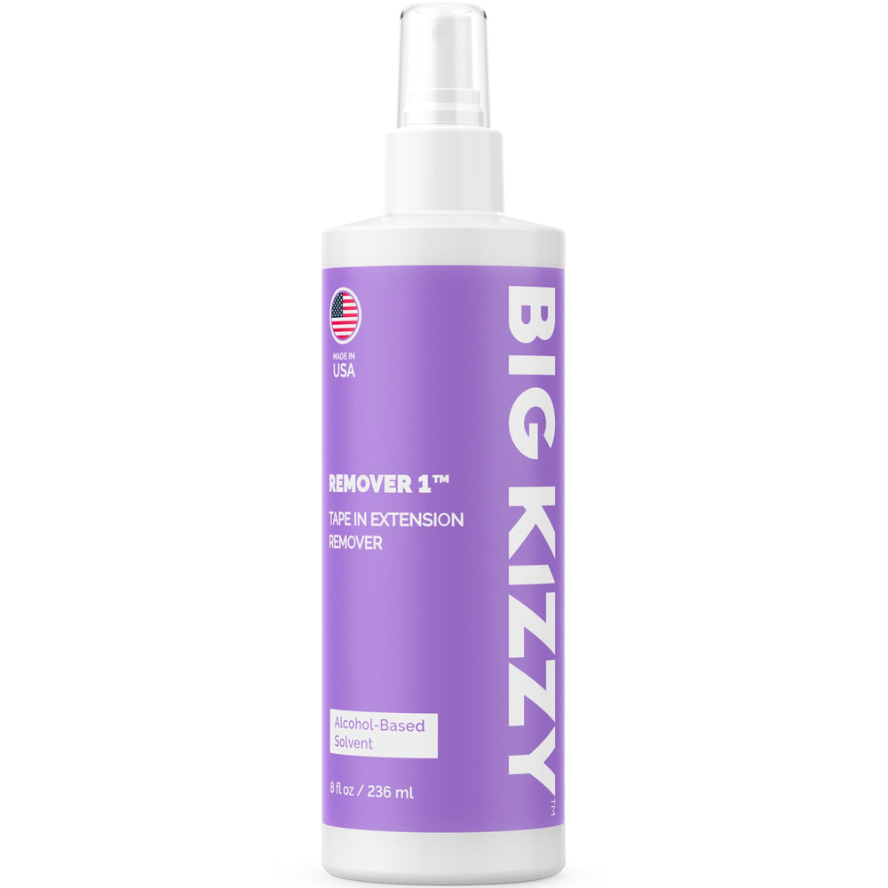 Big Kizzy Tape-In Remover Spray bottle shown for fast adhesive release.