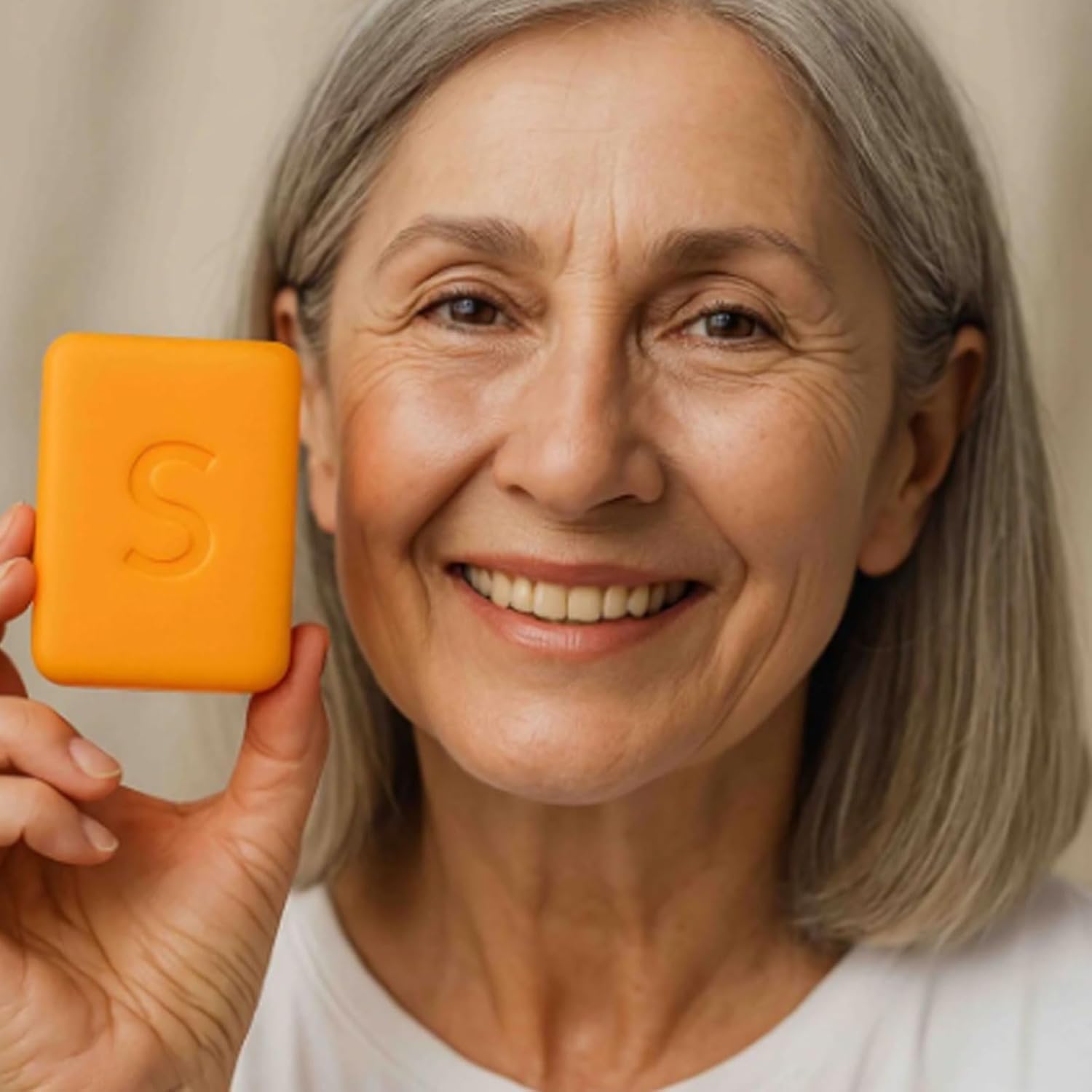 BIJIELAODIAO persimmon soap texture suggests moisturizing lather for dry areas.