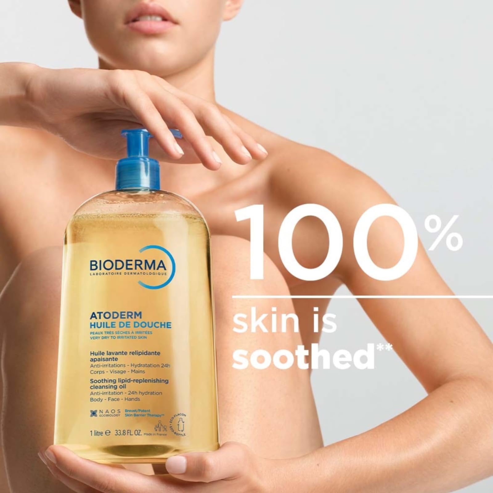 Bioderma Toderm Shower Oil being poured to reveal rich, nourishing texture