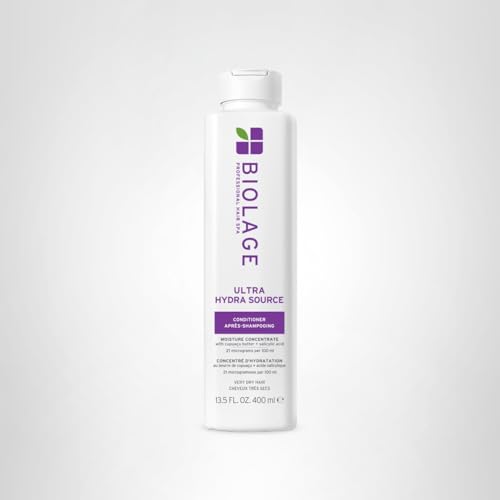 Biolage Ultra Hydra Source conditioner on wet hair for even distribution.