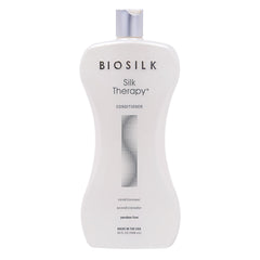 BioSilk Silk Therapy Conditioner bottle glows with radiant shine.