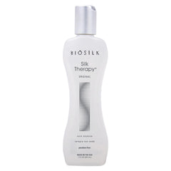 BioSilk Silk Therapy Original bottle pour shows a lightweight leave-in treatment for hair.