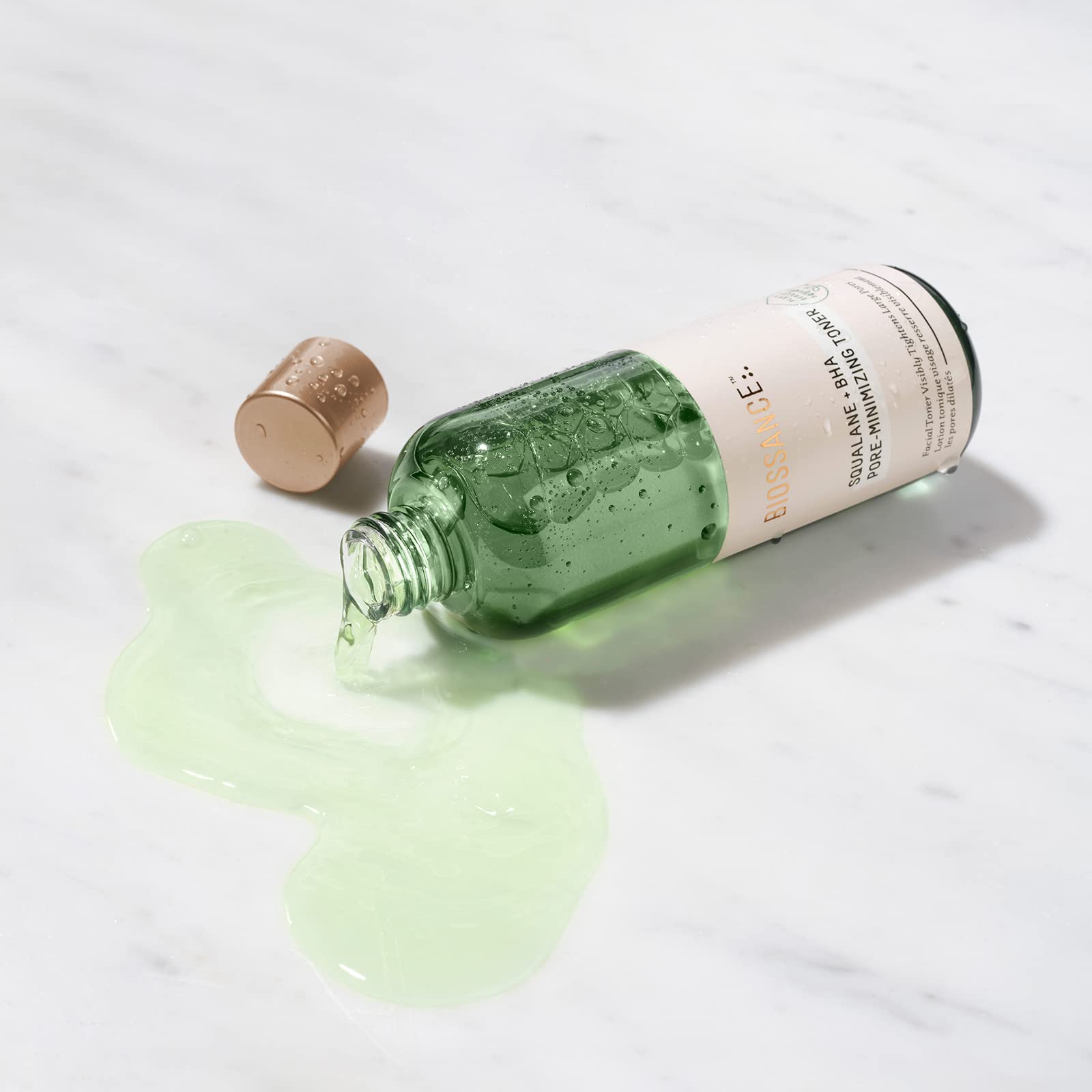 Hydration balance with squalane illustrated by the BIOSSANCE toner bottle.