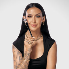 Dual-sided paddle supports foundation, blush, bronzer, and contour