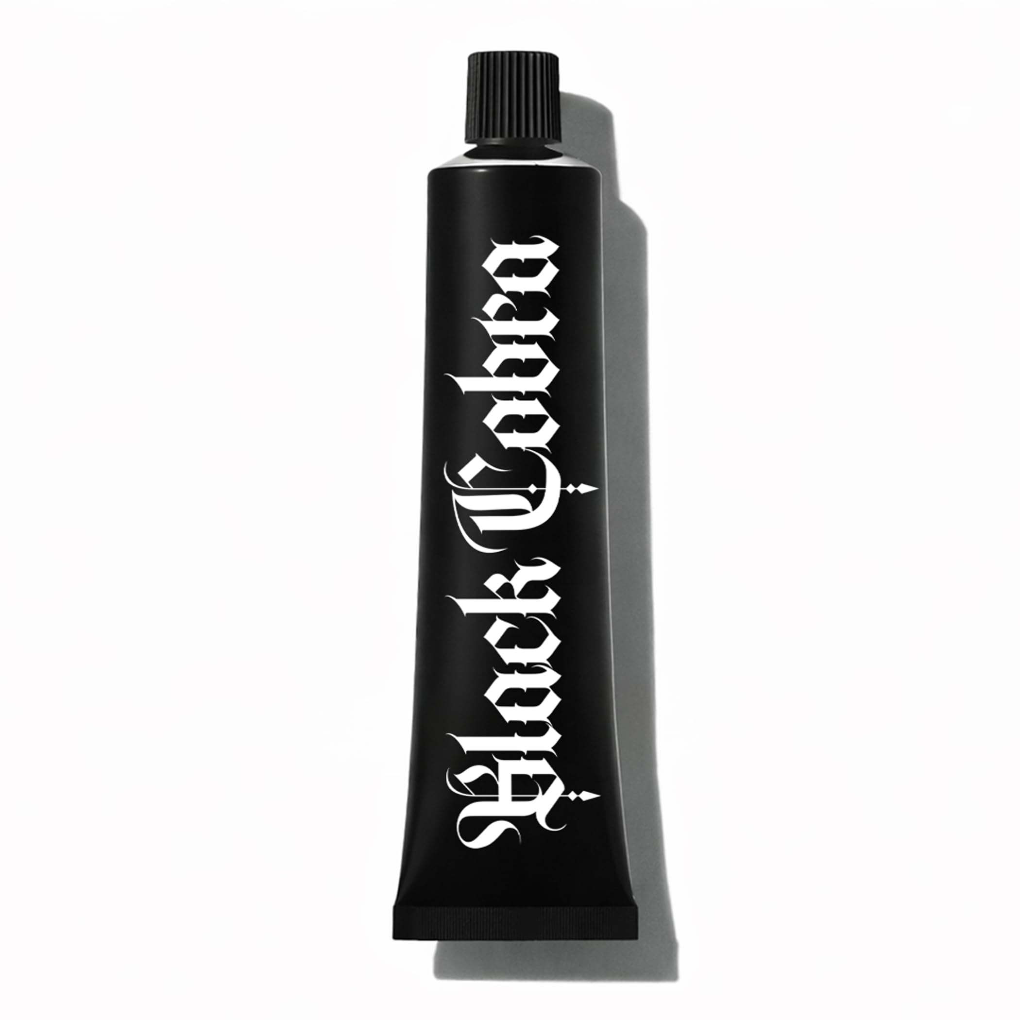Black Cobra Tattoo Comfort Cream tube close-up, showing compact design ideal for studio prep.