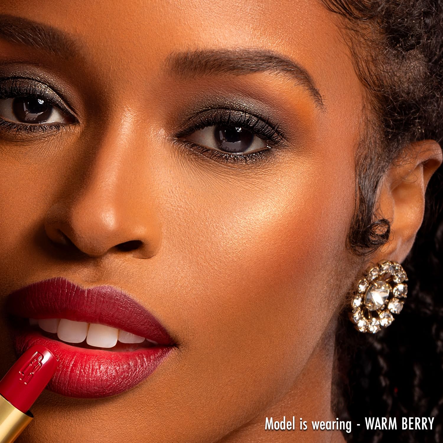 Black Radiance Artisan Color Baked Blush Warm Berry compact close-up highlights matte satin finish.