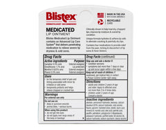 Blistex Labial Medicado: tapa abierta muestra la textura cremosa.