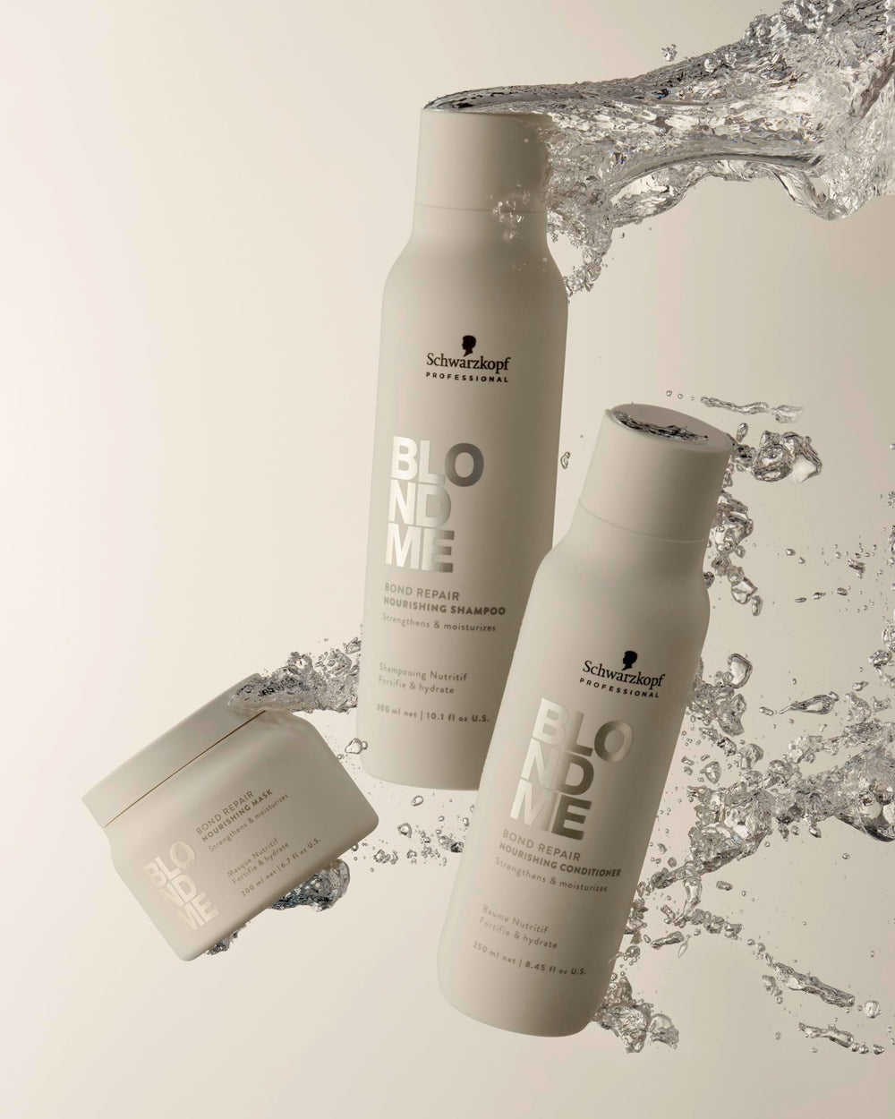 Hands lathering BlondMe Bond Repair Nourishing Shampoo during routine application